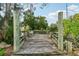Rustic wooden dock with sturdy posts and railings, offering a tranquil waterfront spot at 14904 Old Dixie Hwy, Hudson, FL 34667