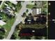 Aerial view showing home's lot lines and canal access at 14904 Old Dixie Hwy, Hudson, FL 34667