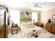 Serene bedroom with a horse-themed mural, comfortable bed, and plenty of storage at 23337 Lake Lindsey Rd, Brooksville, FL 34601