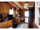 Small tack room with cabinets and storage at 23337 Lake Lindsey Rd, Brooksville, FL 34601
