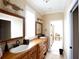 Spacious bathroom with double sinks, large mirrors, and a modern design at 23337 Lake Lindsey Rd, Brooksville, FL 34601