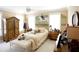 Lovely bedroom with a horse-themed mural, comfortable bed, and wooden furniture at 23337 Lake Lindsey Rd, Brooksville, FL 34601