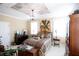 Bright bedroom with a painted ceiling, comfortable bed, and lots of natural light at 23337 Lake Lindsey Rd, Brooksville, FL 34601