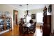 Formal dining room featuring a large wooden table and antique furniture at 23337 Lake Lindsey Rd, Brooksville, FL 34601