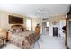 Spacious Primary bedroom with ample natural light and ensuite bath at 23337 Lake Lindsey Rd, Brooksville, FL 34601