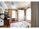 Primary bathroom featuring a jetted tub and walk-in shower at 23337 Lake Lindsey Rd, Brooksville, FL 34601