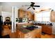 Kitchen with center island, gas cooktop, and ample counter space at 23337 Lake Lindsey Rd, Brooksville, FL 34601