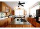 Kitchen boasting granite countertops and custom cabinetry at 23337 Lake Lindsey Rd, Brooksville, FL 34601