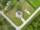 Overhead view of the house and yard at 5481 Nodoc Rd, Spring Hill, FL 34609