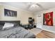 Bedroom with double bed, desk, and Miami Heat decor at 303 Old Mill Pond Rd # 303, Palm Harbor, FL 34683