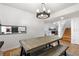 Farmhouse dining table with bench seating in bright dining room at 303 Old Mill Pond Rd # 303, Palm Harbor, FL 34683