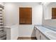 Simple bathroom with a single vanity and wood blinds at 303 Old Mill Pond Rd # 303, Palm Harbor, FL 34683