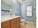 Modern bathroom with quartz countertop and new fixtures at 11027 Eagle Bend Dr, Hudson, FL 34667