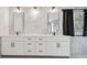 Modern bathroom vanity with double sinks and white cabinets at 1545 Regal Mist Loop, Trinity, FL 34655