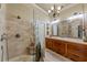 Elegant bathroom with a large shower and double vanity at 4109 Des Prez Ct, Hernando Beach, FL 34607