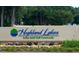 Highland Lakes Active Adult Golf Community entrance sign at 1218 Gillespie N Dr, Palm Harbor, FL 34684