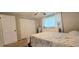 Spacious bedroom with double door closet and carpeted floors at 3814 Holiday Lake Dr, Holiday, FL 34691
