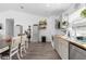 Kitchen with gray cabinets and butcher block countertops at 15236 Mottled Owl Rd, Brooksville, FL 34614