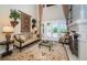 Sitting area with fireplace and access to patio at 9943 Milano Dr, Trinity, FL 34655
