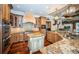 Large kitchen with double sink, granite countertops, and ample cabinetry at 9943 Milano Dr, Trinity, FL 34655