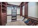 Large walk-in closet with ample shelving and hanging space at 9943 Milano Dr, Trinity, FL 34655