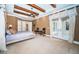 Elegant main bedroom with high ceilings, French doors, and hardwood floors at 9943 Milano Dr, Trinity, FL 34655