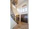Grand entryway with a curved staircase and high ceilings at 9943 Milano Dr, Trinity, FL 34655