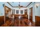 Spacious office featuring hardwood floors and custom wood details at 9943 Milano Dr, Trinity, FL 34655