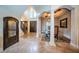 Formal dining area with columns and a decorative rug at 9943 Milano Dr, Trinity, FL 34655