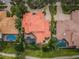 Aerial view of luxury home with tile roof and pool at 9943 Milano Dr, Trinity, FL 34655
