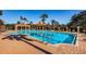 Resort-style pool with spacious deck and cabana at 9943 Milano Dr, Trinity, FL 34655