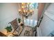 Spacious living room with high ceilings and a cozy sitting area at 9943 Milano Dr, Trinity, FL 34655