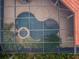 Enclosed pool and spa area with surrounding landscaping at 9943 Milano Dr, Trinity, FL 34655