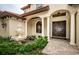 Ornate fountain accents the front entrance at 9943 Milano Dr, Trinity, FL 34655