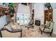 Cozy sitting area with fireplace and French doors at 9943 Milano Dr, Trinity, FL 34655