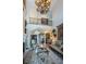 Spacious living room with high ceilings and a two-story foyer at 9943 Milano Dr, Trinity, FL 34655
