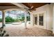 Spacious pool and spa area with covered patio and lush landscaping at 9943 Milano Dr, Trinity, FL 34655