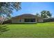 Large backyard with grassy lawn at 4336 Lightfoot St, Spring Hill, FL 34609
