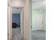Hallway connecting bedrooms with carpeted floors at 4336 Lightfoot St, Spring Hill, FL 34609