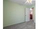 Simple bedroom with ceiling fan and carpet at 4336 Lightfoot St, Spring Hill, FL 34609