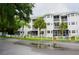 Two-story condo building with white exterior and balconies at 2077 Wetland Pt # 1103, Lutz, FL 33558