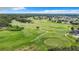 Aerial view of golf course and surrounding homes at 17425 Eagle Trace Dr, Brooksville, FL 34604