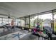 Enclosed patio with dining area and water views at 3178 Sea Grape Dr, Hernando Beach, FL 34607
