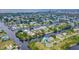 Wide aerial showcasing a waterfront lot in a quiet community at 3178 Sea Grape Dr, Hernando Beach, FL 34607