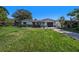 Updated ranch home with new landscaping at 6989 300Th N Ave, Clearwater, FL 33761