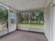 Bright and airy screened porch with backyard view at 9140 & 9130 Peony St, New Port Richey, FL 34654
