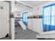 bedroom with mirrored closet and bunk bed at 9140 & 9130 Peony St, New Port Richey, FL 34654