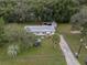 Aerial view of a single Gathering home and yard at 9140 & 9130 Peony St, New Port Richey, FL 34654