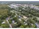 An aerial shot showing a home's location in a residential neighborhood at 9140 & 9130 Peony St, New Port Richey, FL 34654