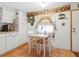 Charming kitchen nook with white table and chairs at 9140 & 9130 Peony St, New Port Richey, FL 34654